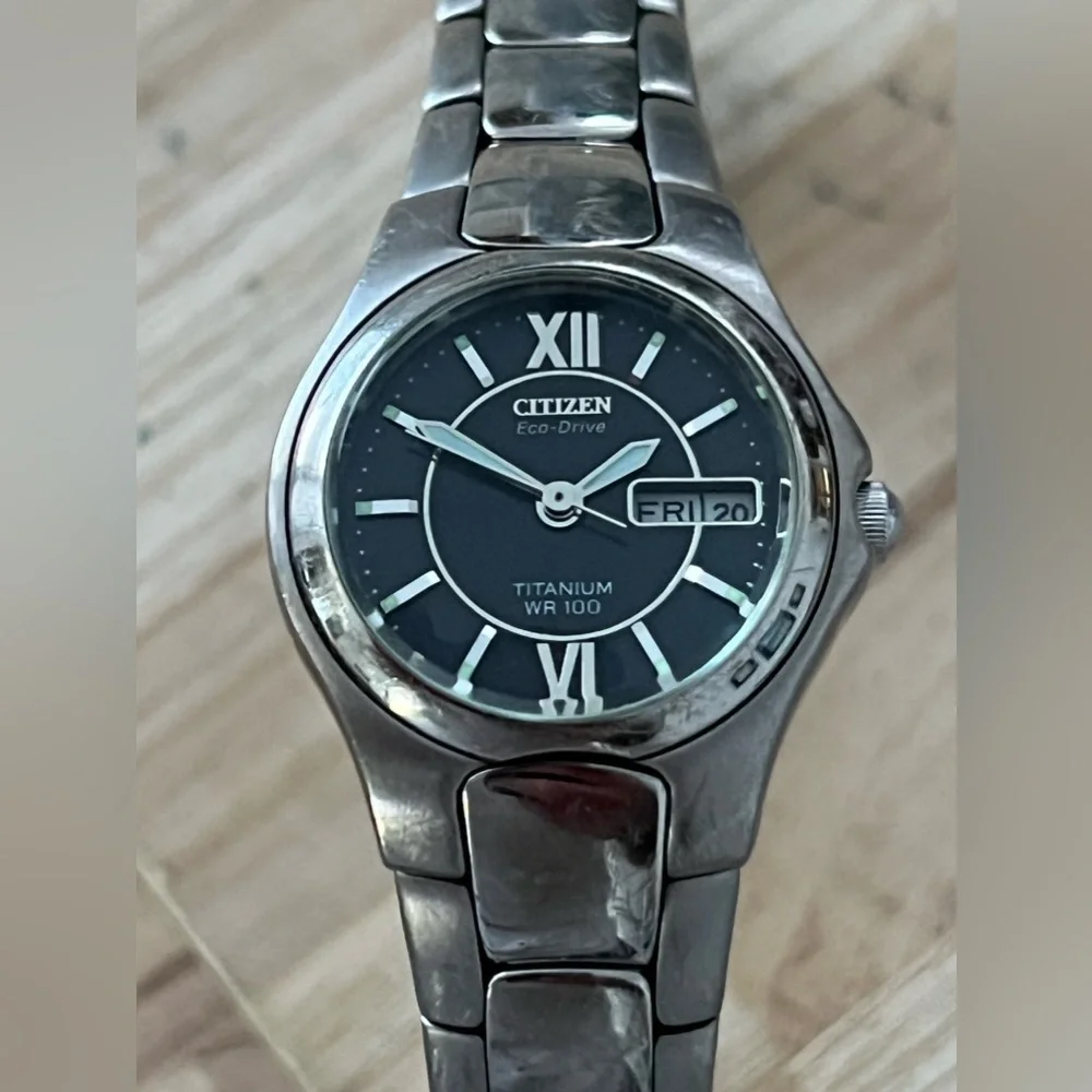 Citizen Eco-Drive Titanium Solar Black Dial Day Date Window Titanium Bracelet